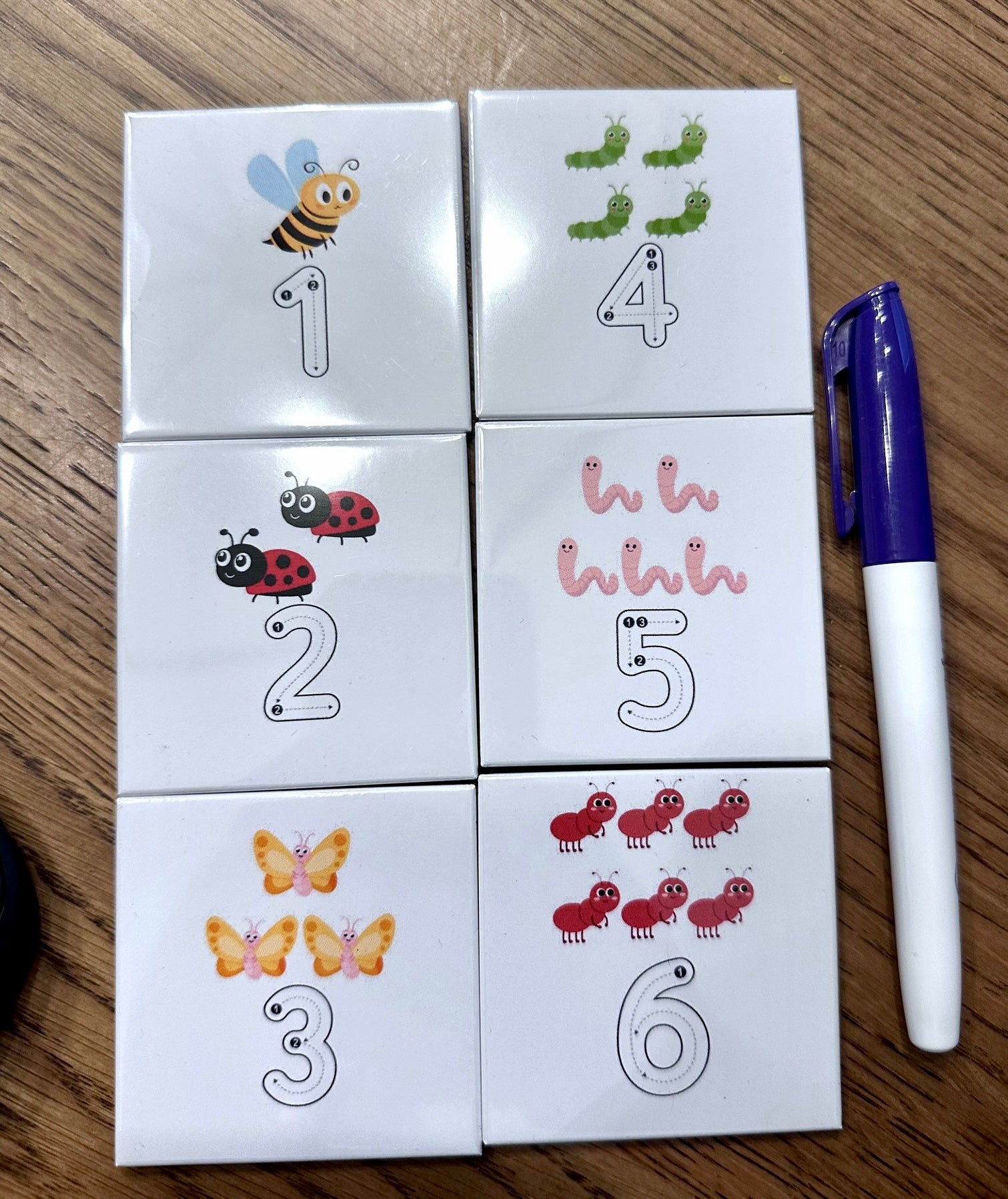 Kids tracing magnet set with letters and numbers plus a dry erase marker, handmade by Lifetime Magnets