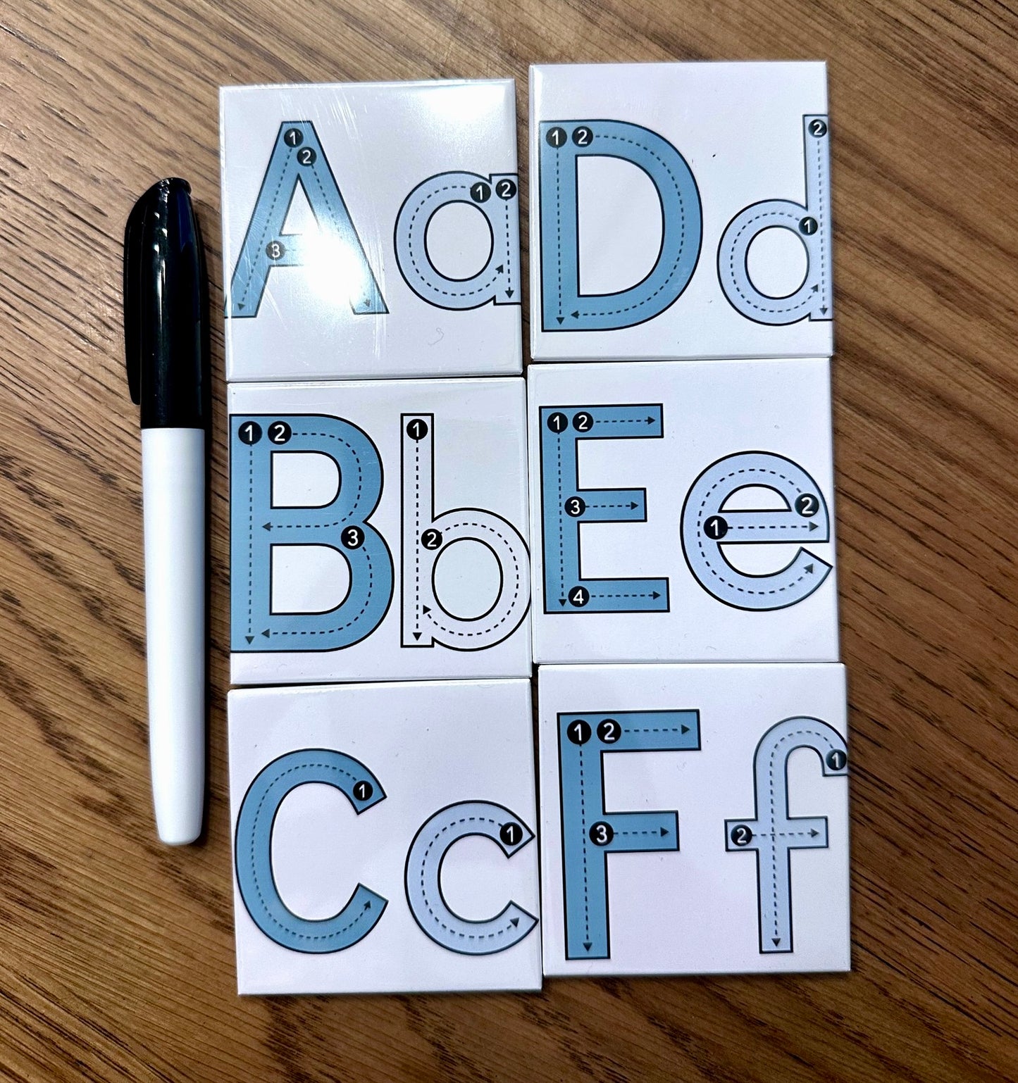 Kids tracing magnet set with letters and numbers plus a dry erase marker, handmade by Lifetime Magnets