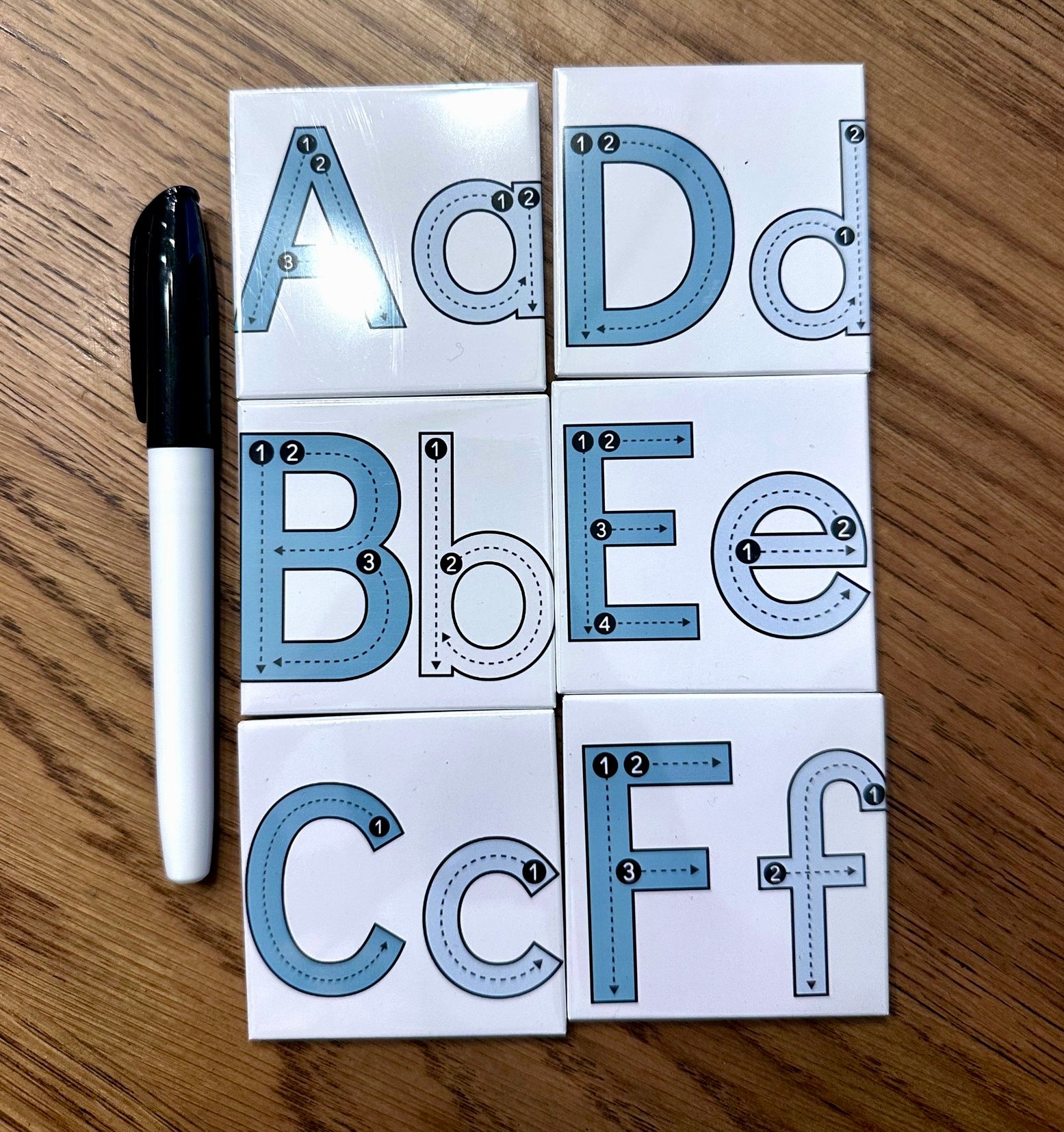 Kids tracing magnet set with letters and numbers plus a dry erase marker, handmade by Lifetime Magnets